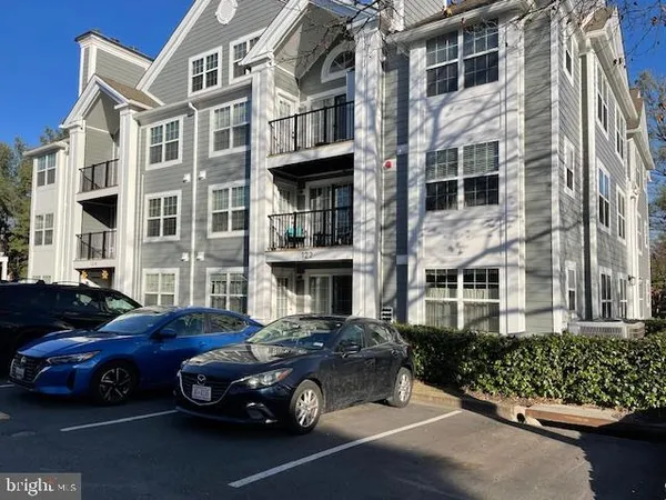 a car parked in front of a building