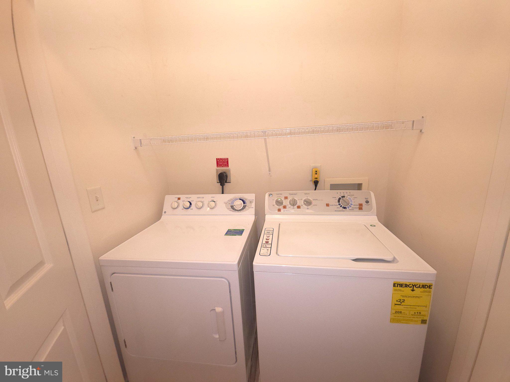 7 Booth Street, Unit 308 Gaithersburg, MD 20878 - Photo 15 of 21 a utility room with dryer and washer