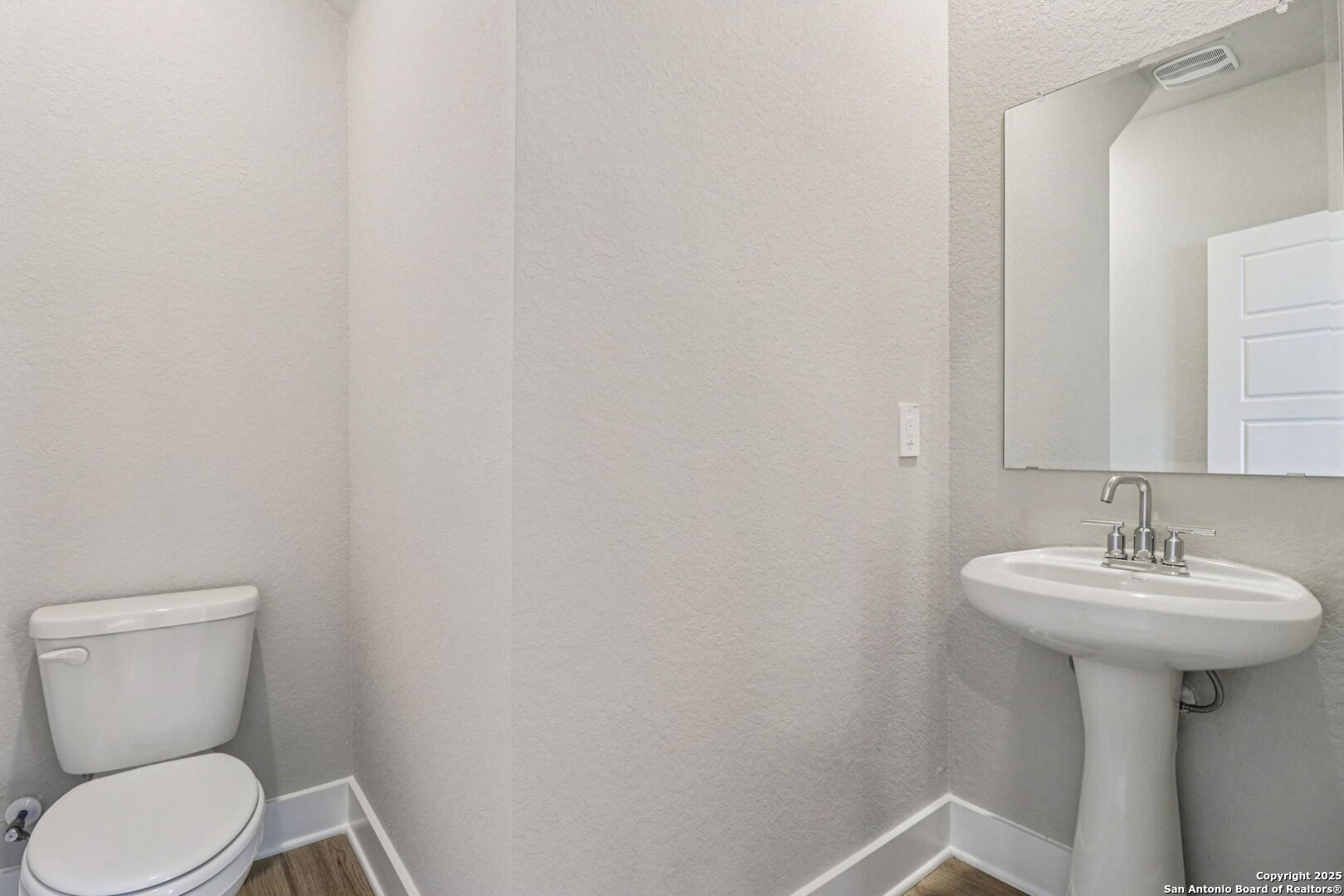 12602 Winding Butte Schertz, TX 78154 - Photo 17 of 46 a bathroom with a sink toilet and a mirror