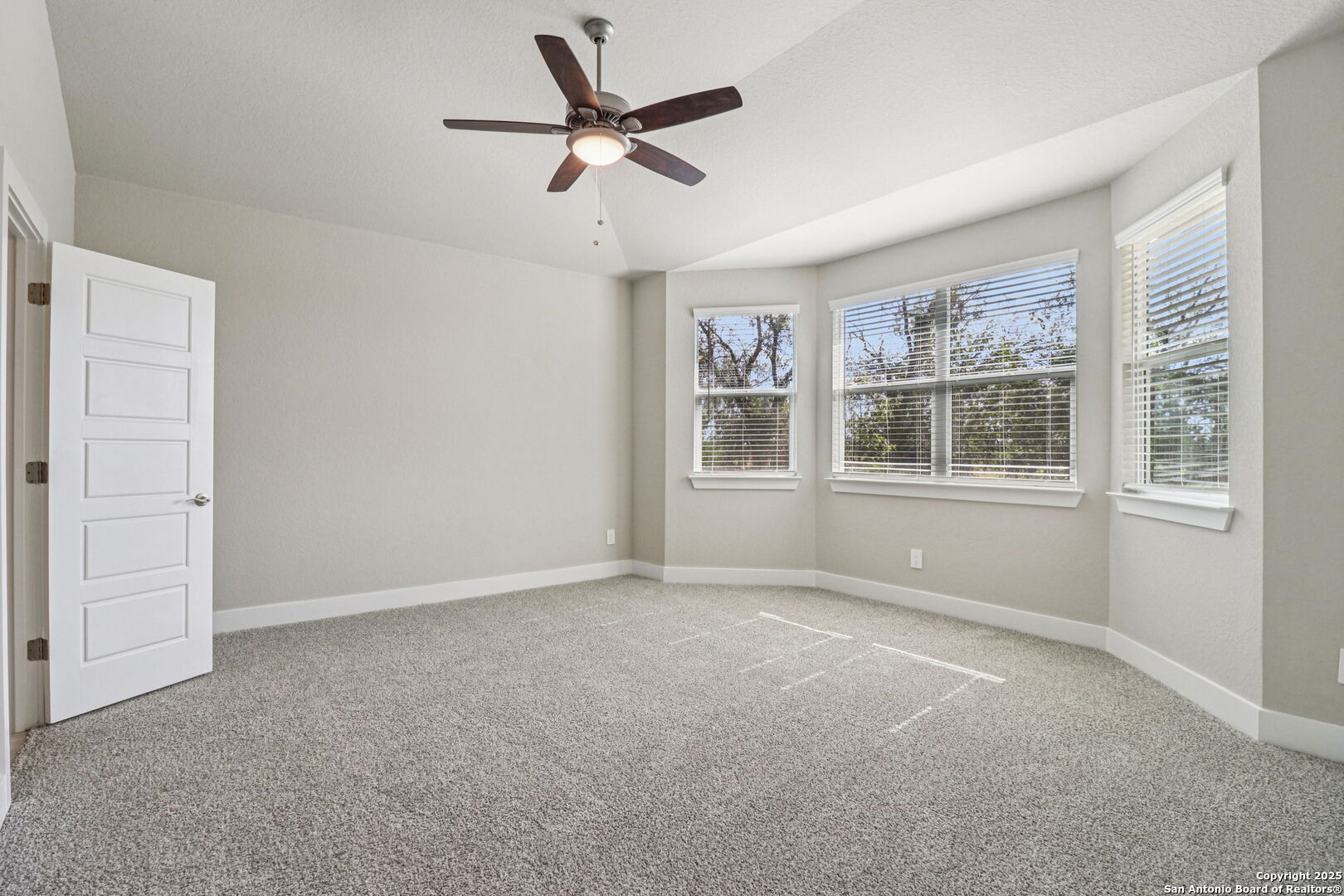 12602 Winding Butte Schertz, TX 78154 - Photo 18 of 46 wooden floor in an empty room with a window