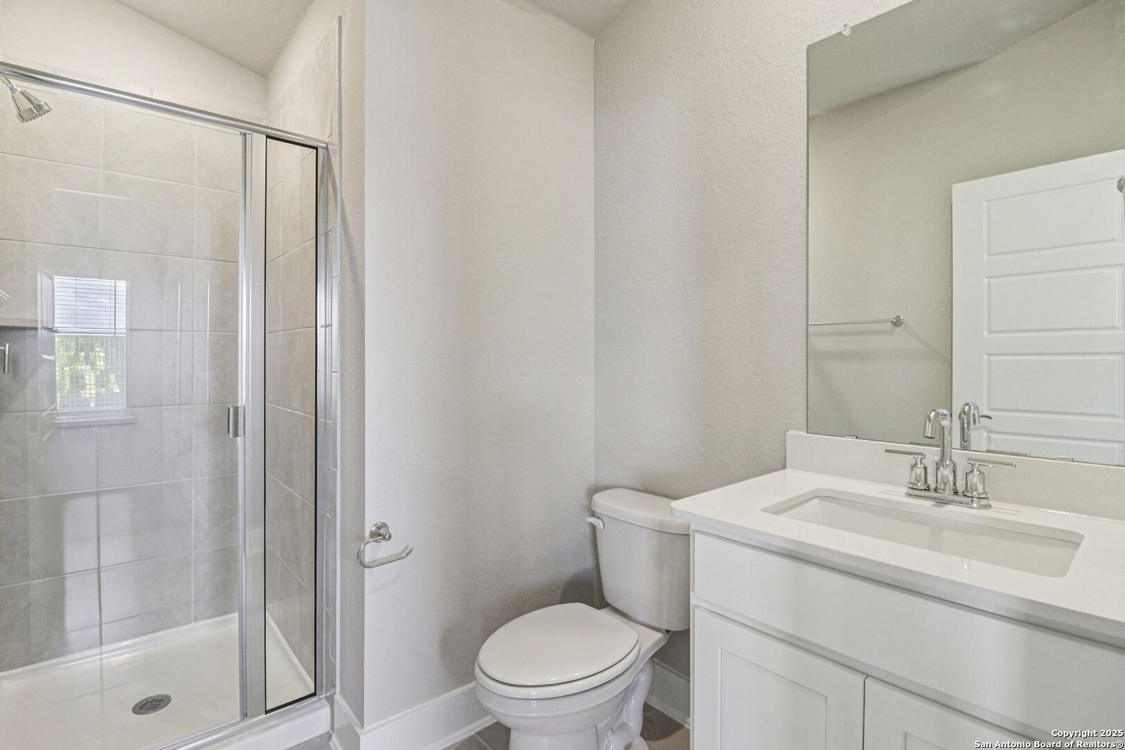 12602 Winding Butte Schertz, TX 78154 - Photo 30 of 46 a bathroom with a sink a toilet and shower