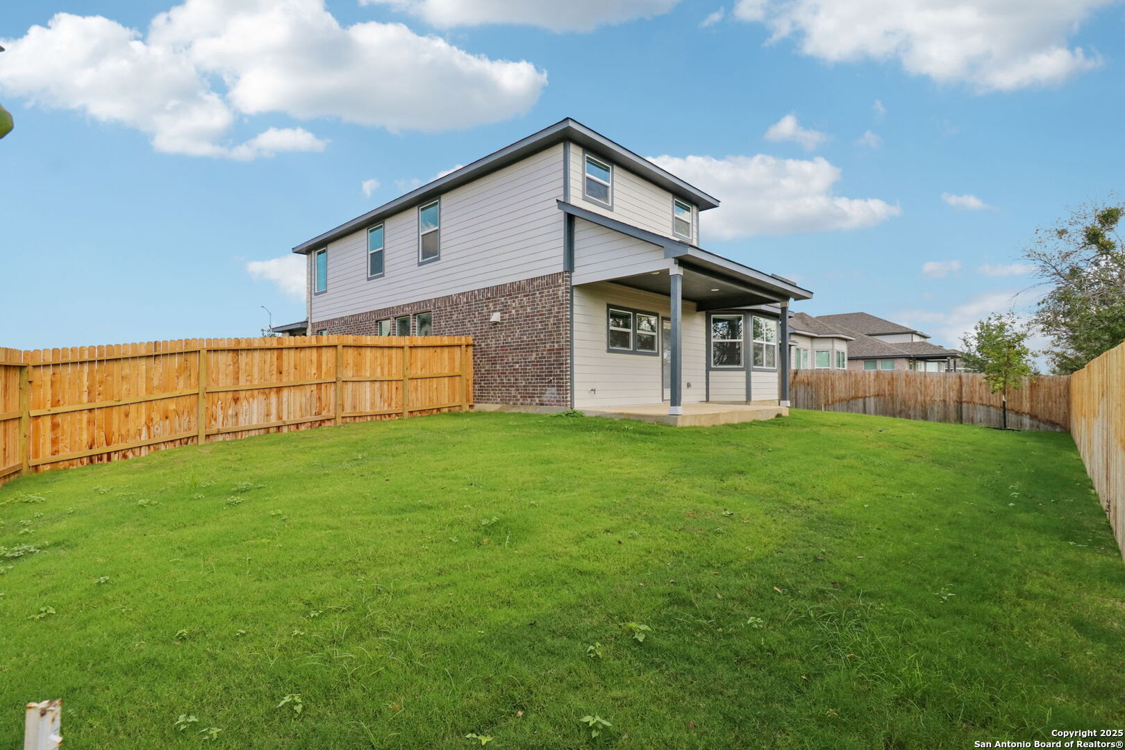 12602 Winding Butte Schertz, TX 78154 - Photo 40 of 46 a view of a backyard with plants and a garden