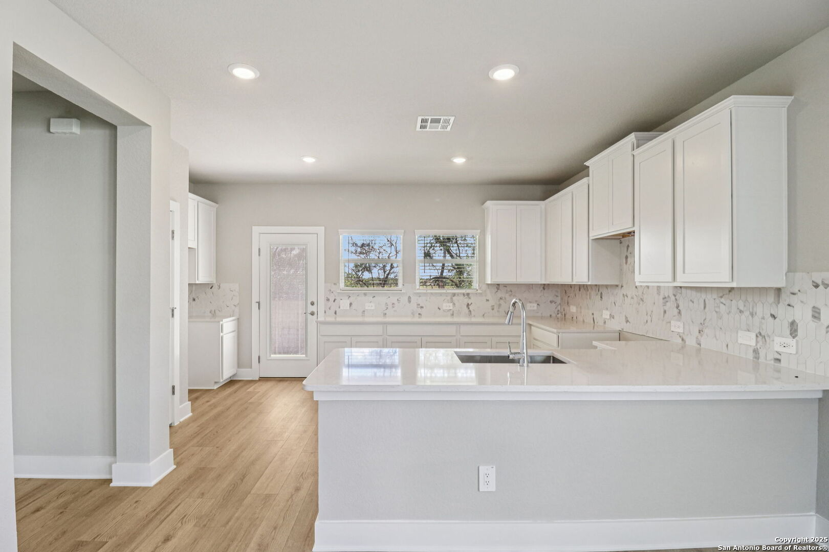 12602 Winding Butte Schertz, TX 78154 - Photo 10 of 46 a bathroom with a sink and a mirror
