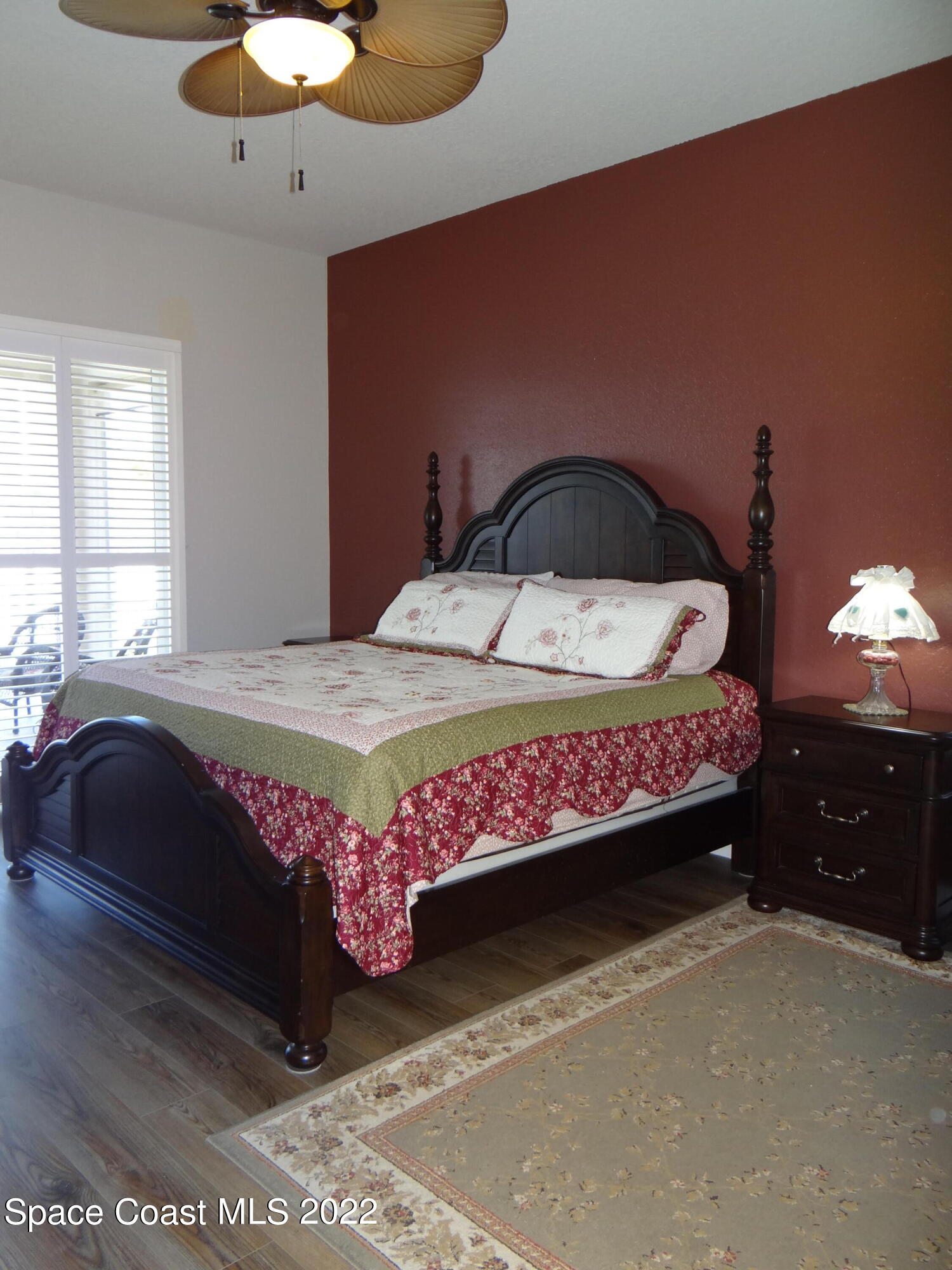 3100 Huntleigh Way Melbourne, FL 32934 - Photo 20 of 54 a bedroom with a bed dresser and a window