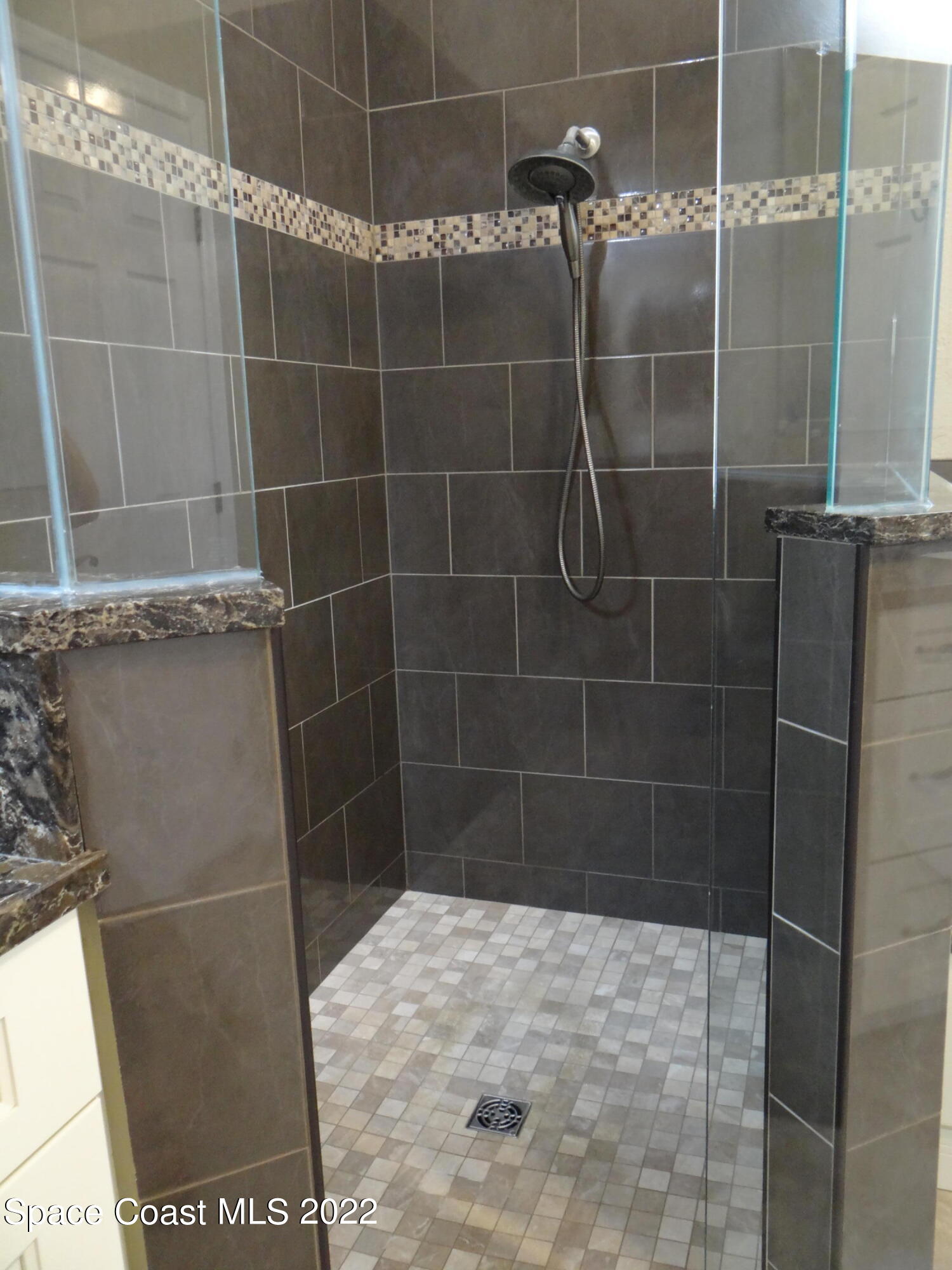 3100 Huntleigh Way Melbourne, FL 32934 - Photo 30 of 54 Primary shower tile (2)