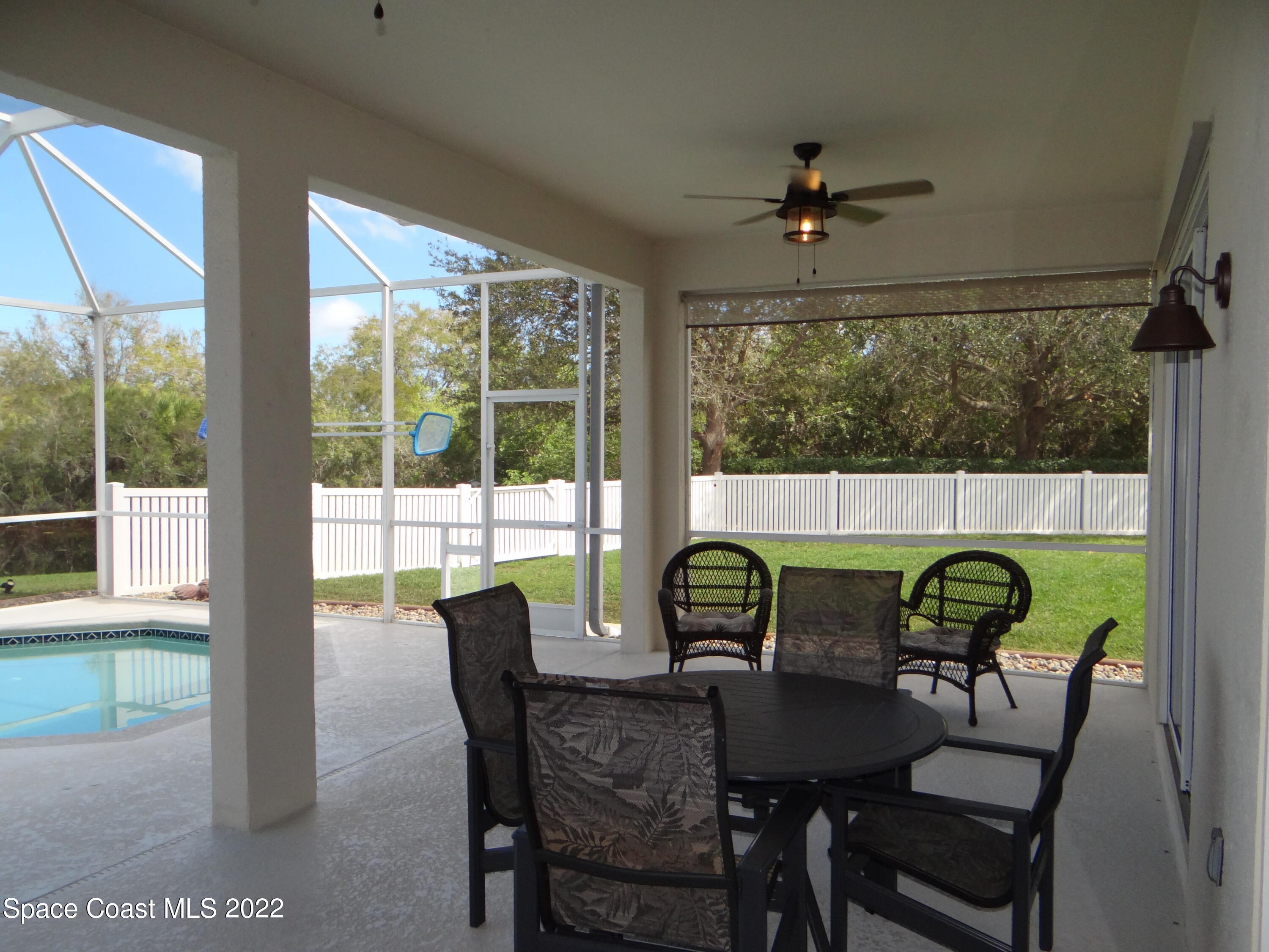 3100 Huntleigh Way Melbourne, FL 32934 - Photo 41 of 54 a view of a dining room with furniture window and outside view