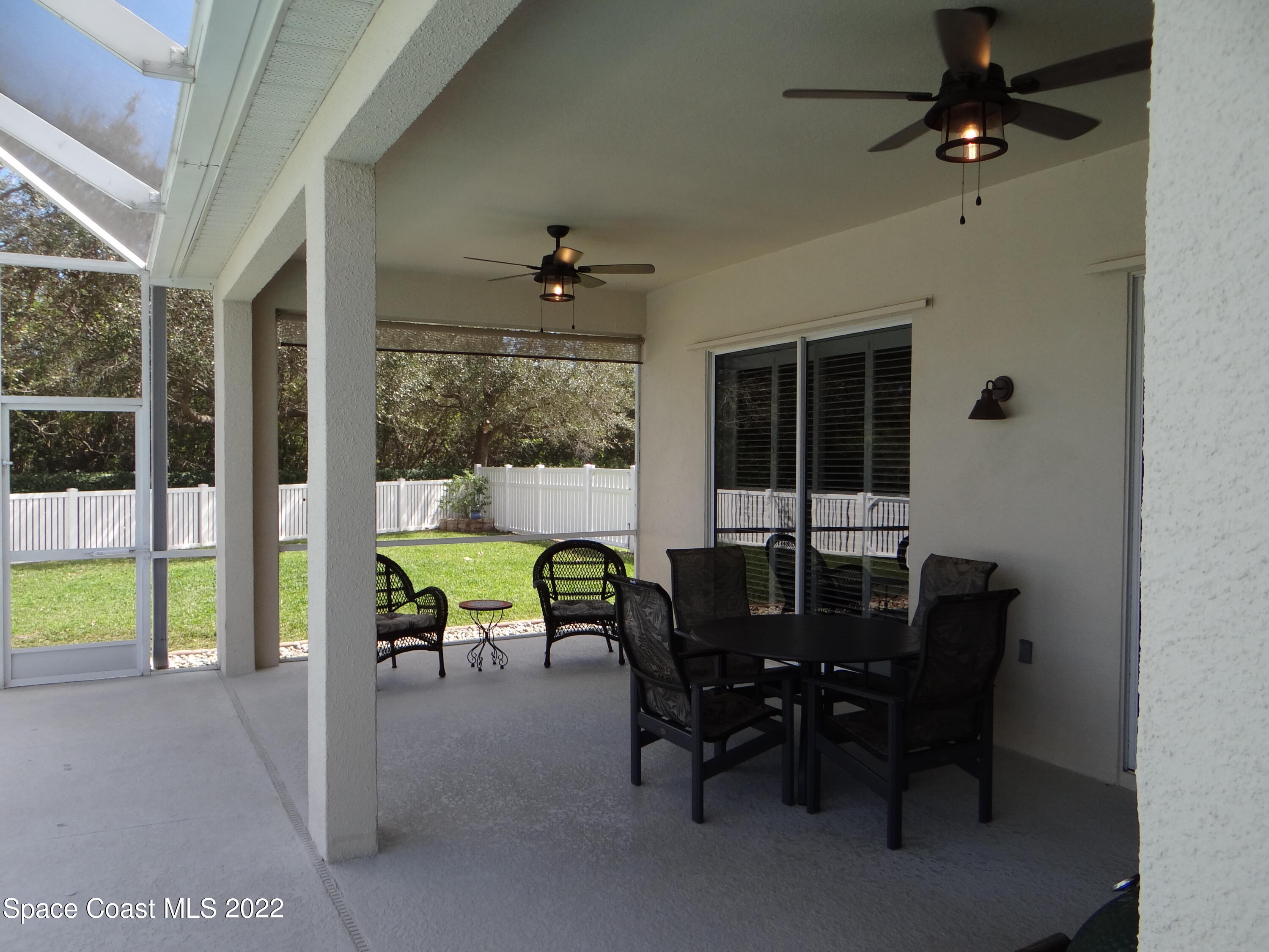 3100 Huntleigh Way Melbourne, FL 32934 - Photo 44 of 54 a view of a dining room with furniture window and outside view