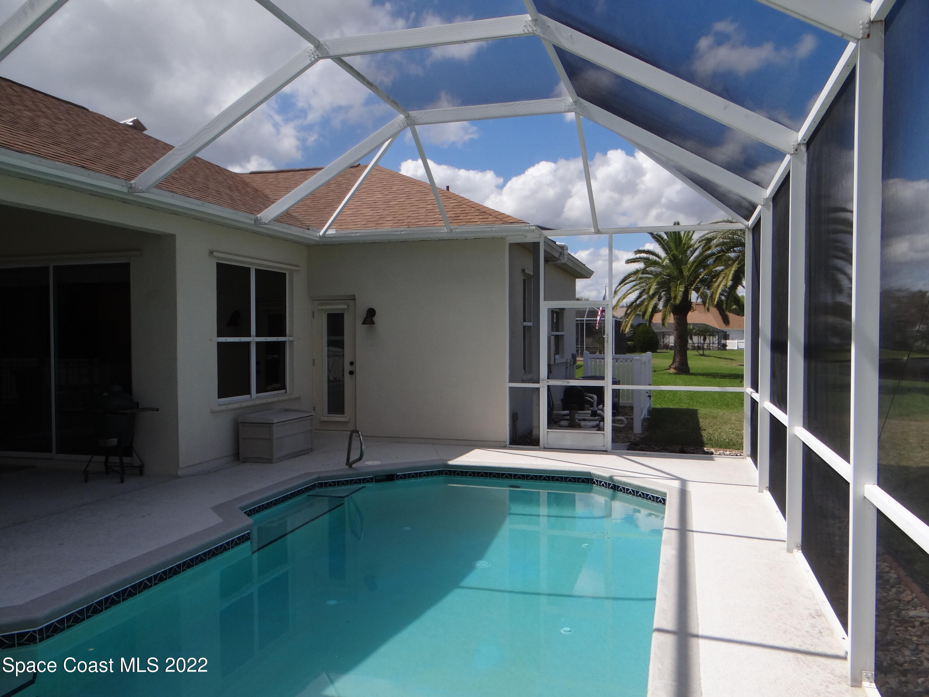 3100 Huntleigh Way Melbourne, FL 32934 - Photo 46 of 54 a view of swimming pool with seating space