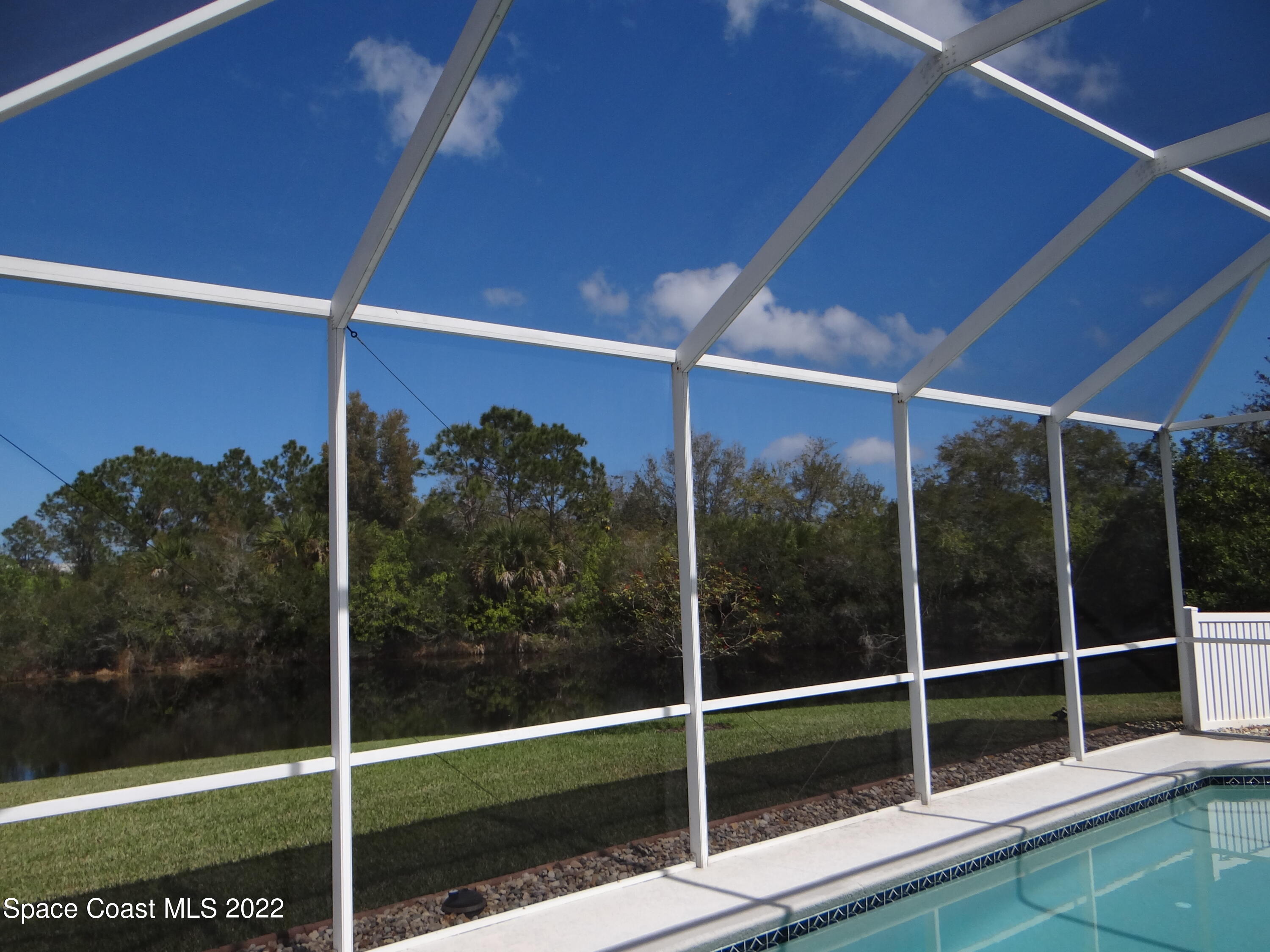 3100 Huntleigh Way Melbourne, FL 32934 - Photo 48 of 54 a view of a glass door