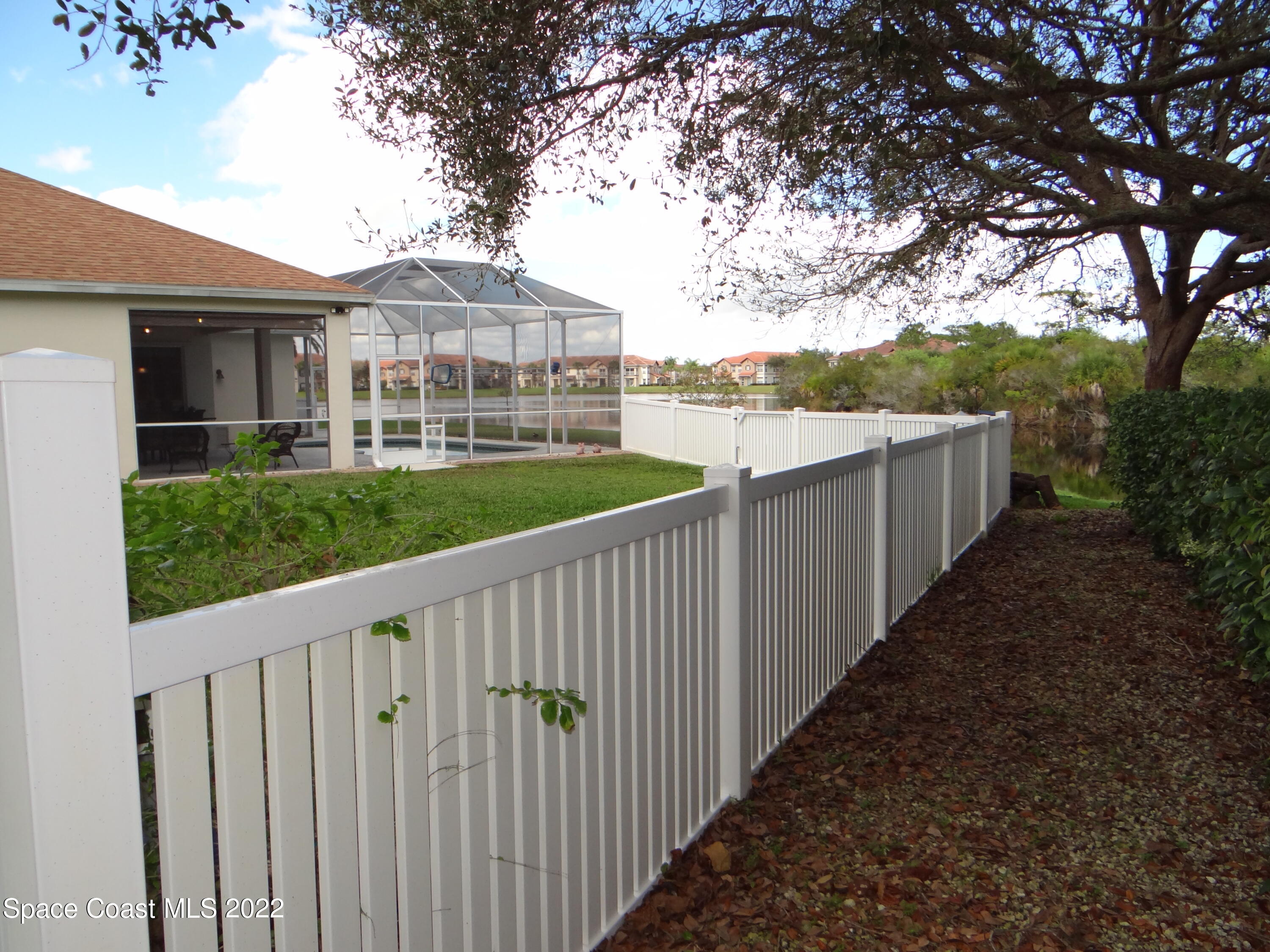 3100 Huntleigh Way Melbourne, FL 32934 - Photo 52 of 54 a view of a house with backyard and deck