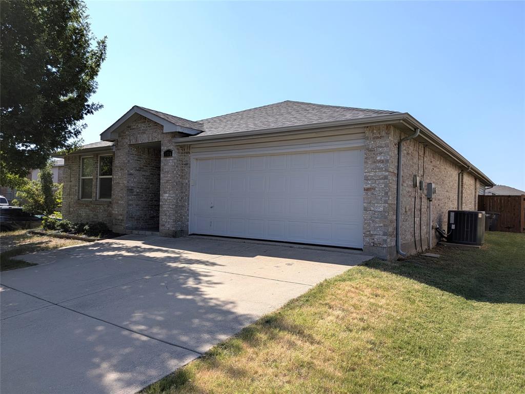 1736 Carolina Ridge Way Fort Worth, TX 76247 - Photo 3 of 33 Brick exterior with a gabled entry
