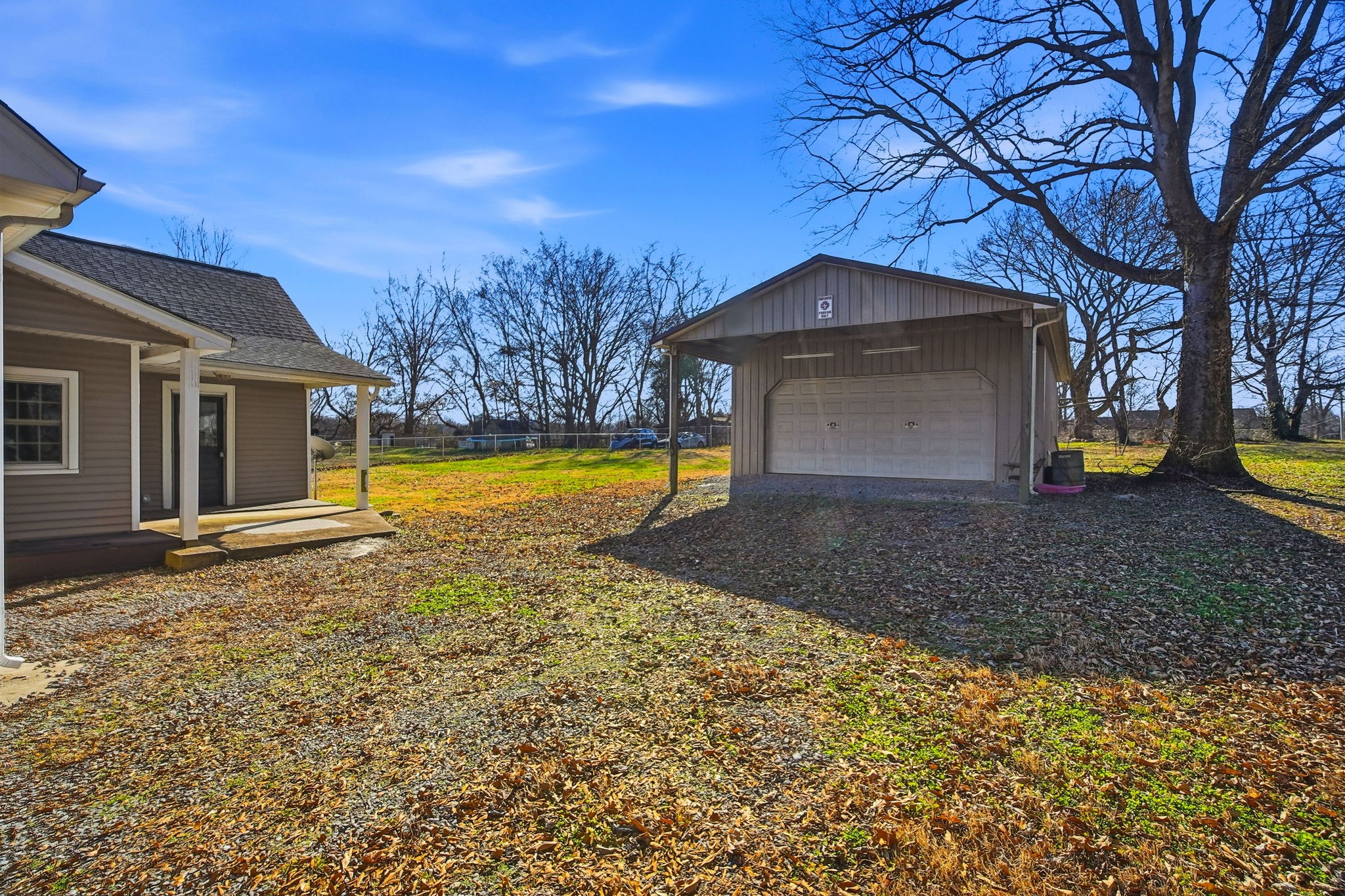 204 Winters Street Adams, TN 37010 - Photo 17 of 18 a view of a house with a yard