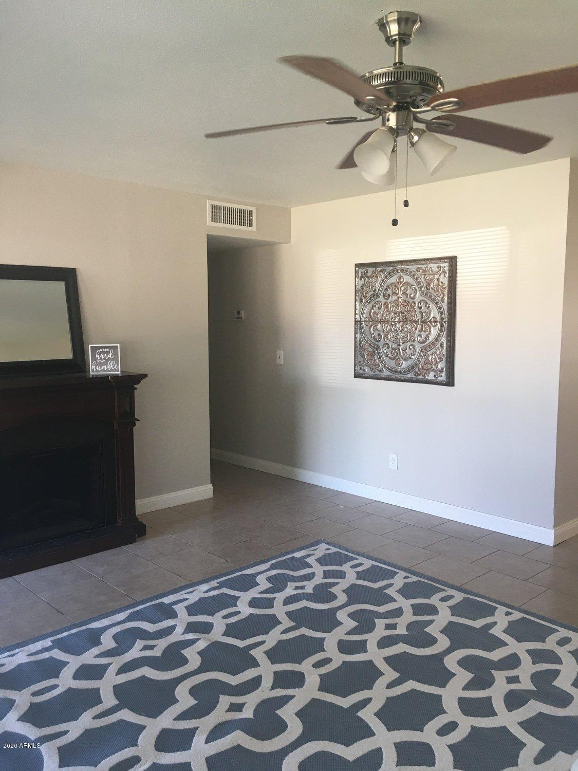 7401 West Hatcher Road Peoria, AZ 85345 - Photo 2 of 5 living room 1