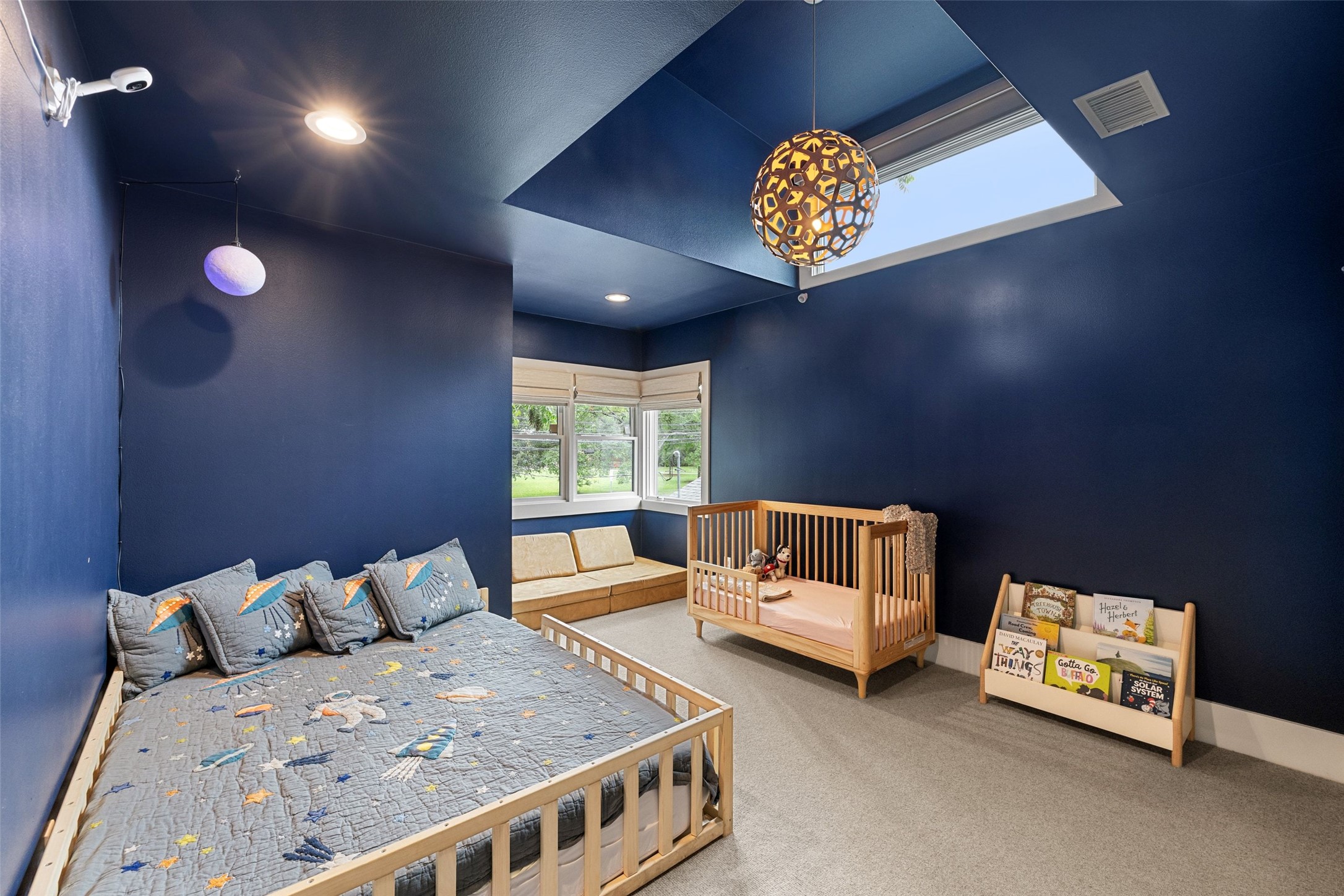 2000 Rundell Place Austin, TX 78704 - Photo 32 of 38 A skylight and large windows naturally illuminate this spacious and playful room.