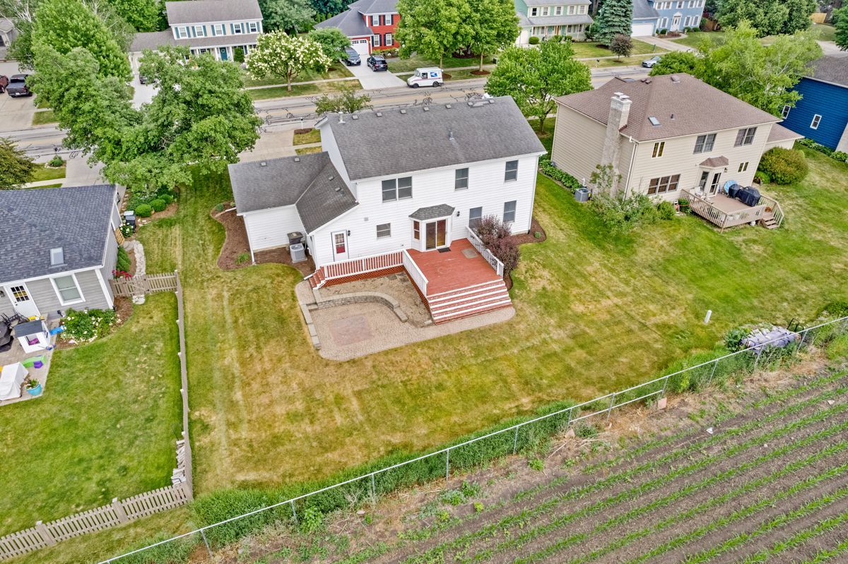 753 Millview Drive Batavia, IL 60510 - Photo 27 of 30 an aerial view of residential house with outdoor space and trees all around
