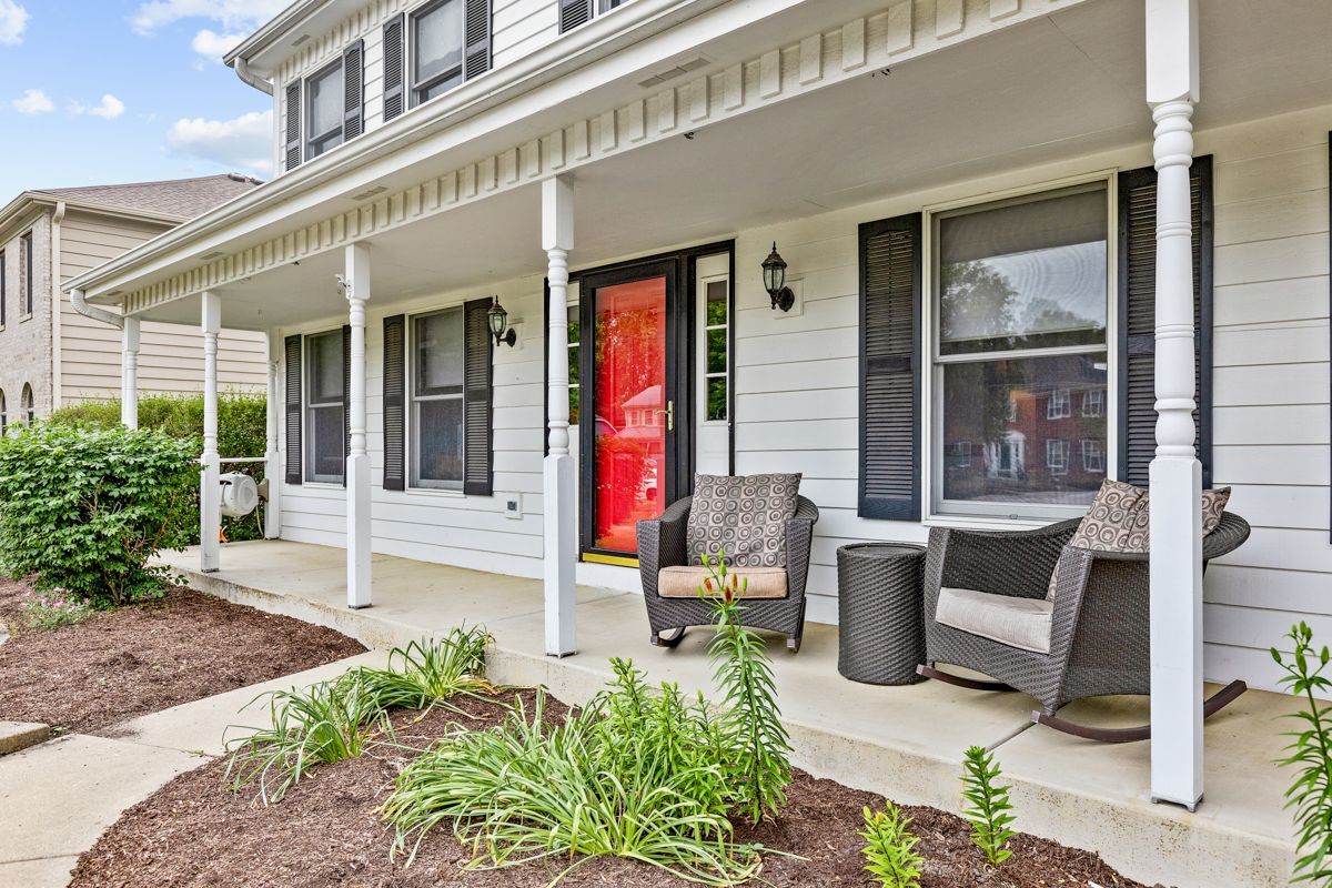 753 Millview Drive Batavia, IL 60510 - Photo 3 of 30 a view of a patio with table and chairs and potted plants