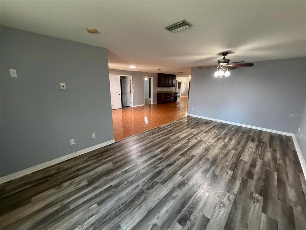 9816 East Granada Court Inverness, FL 34450 - Photo 27 of 28 wooden floor in an empty room with a window