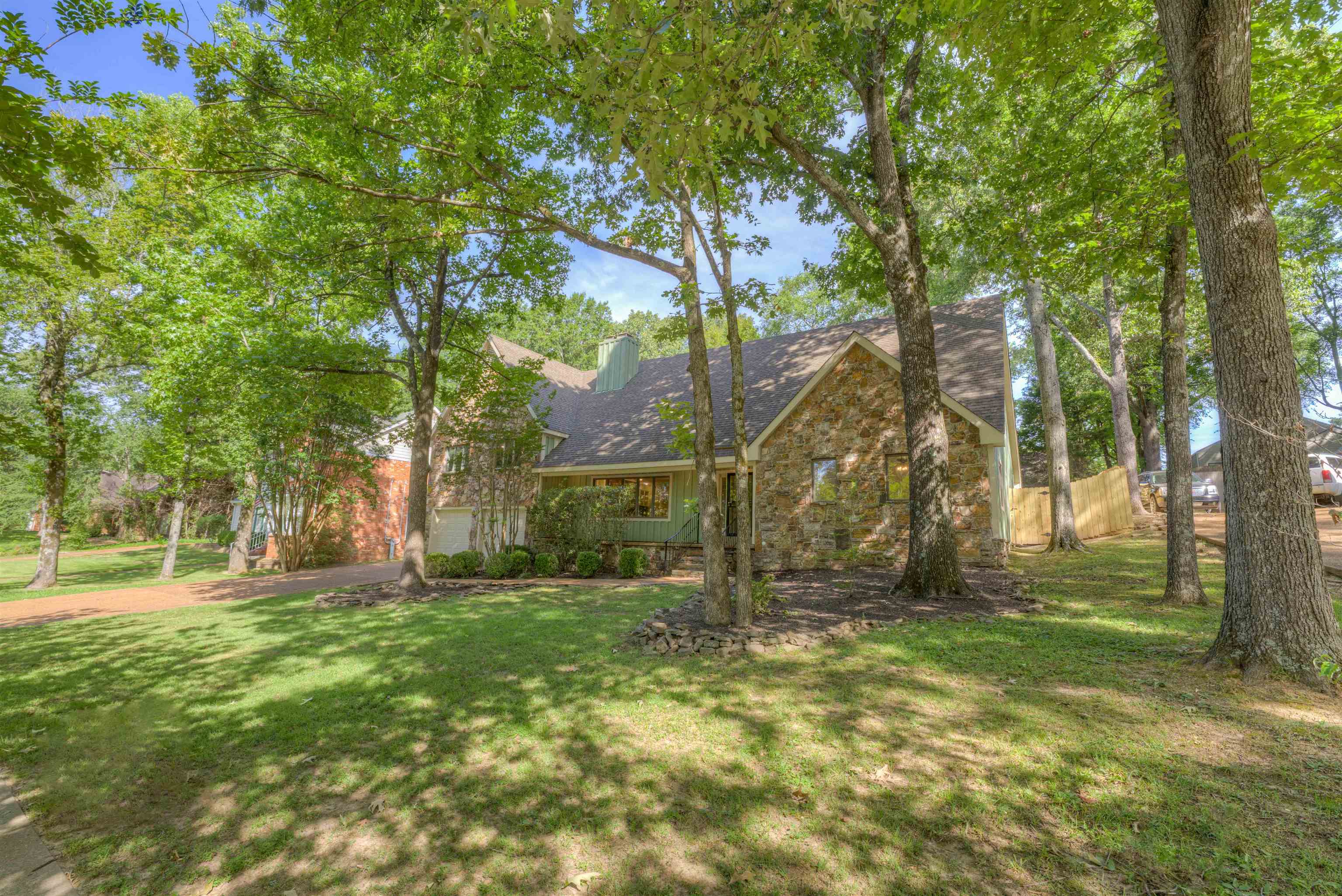 133 South Walnut Bend Road Memphis, TN 38018 - Photo 6 of 39 a view of a yard with a tree