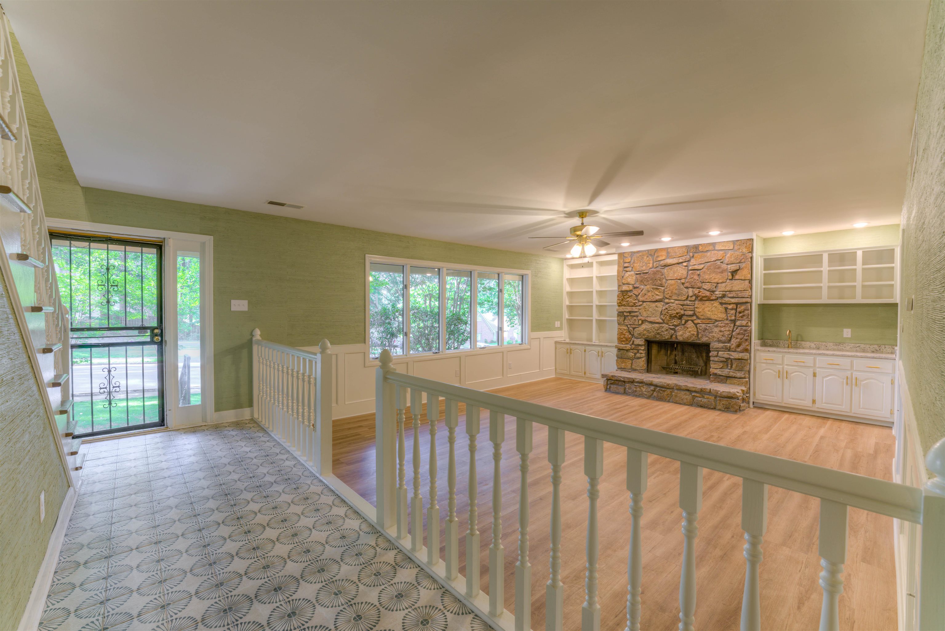 133 South Walnut Bend Road Memphis, TN 38018 - Photo 8 of 39 a view of a porch with wooden floor and fence