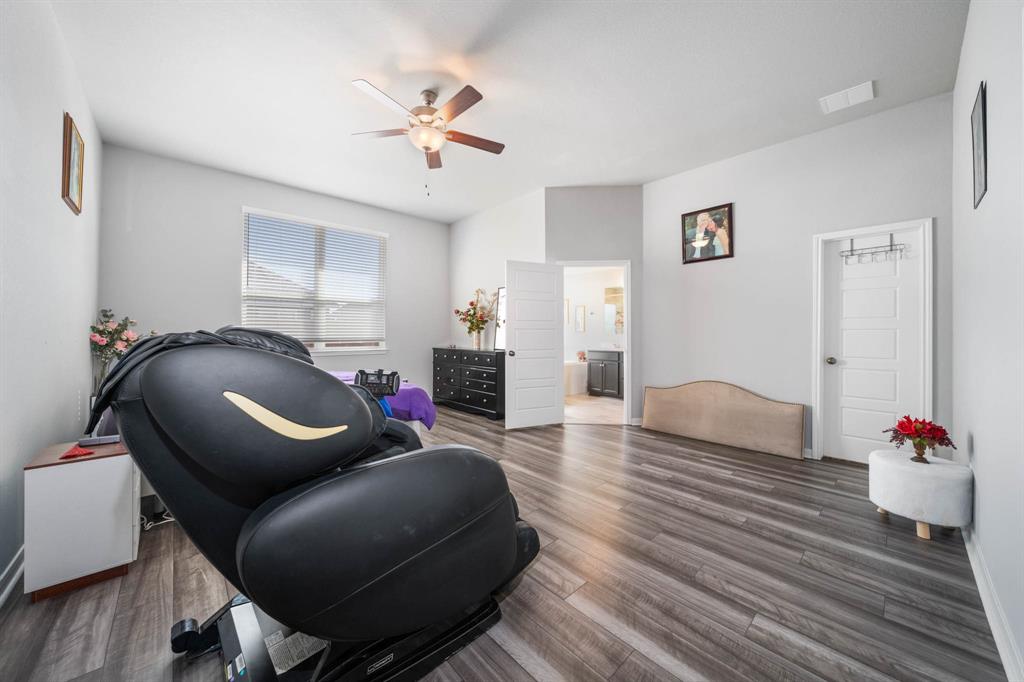 3409 Beutel Road Lorena, TX 76655 - Photo 15 of 32 a living room with furniture and wooden floor