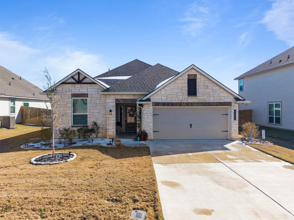 3409 Beutel Road Lorena, TX 76655 - Photo 2 of 32 a front view of a house with a yard