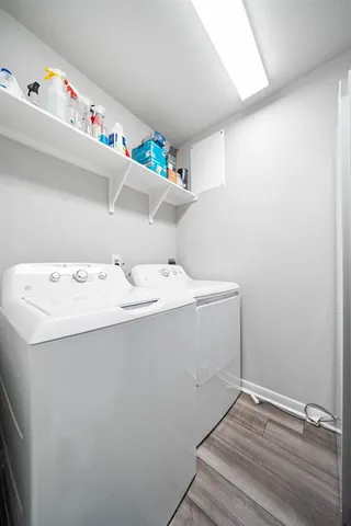a utility room with dryer and washer