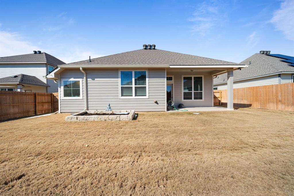 3409 Beutel Road Lorena, TX 76655 - Photo 25 of 32 a front view of a house with a yard