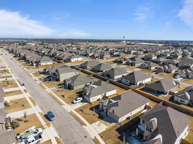 an aerial view of a residential building