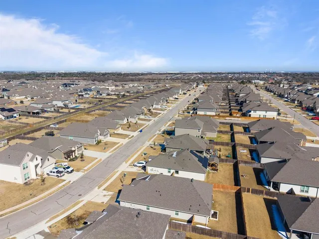 a view of living room with furniture and a flat screen tv