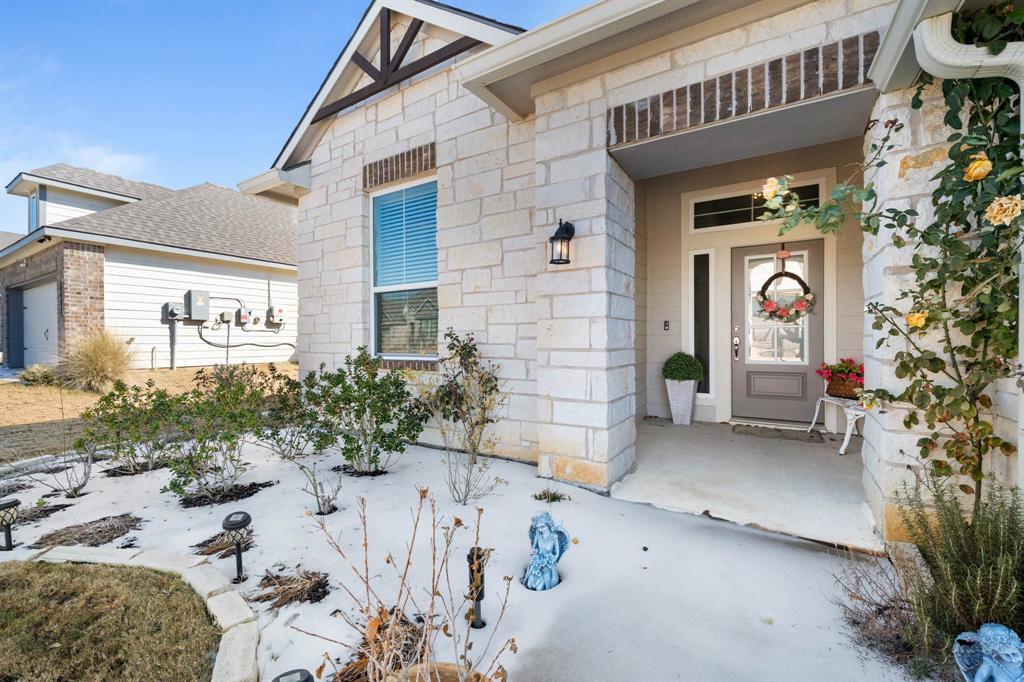 3409 Beutel Road Lorena, TX 76655 - Photo 4 of 32 a front view of a house with garden