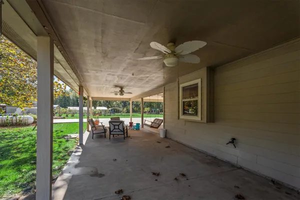 a view of a porch with furniture