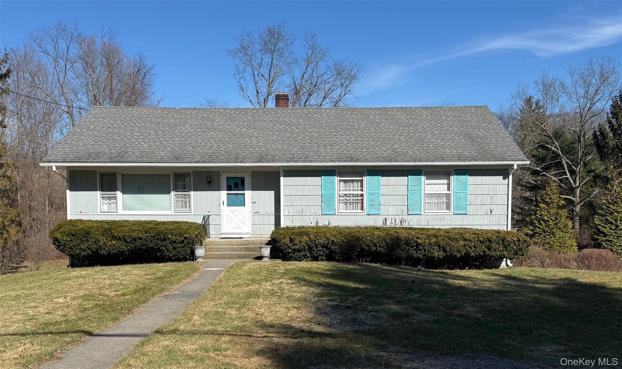 126 Perrys Corners Road Amenia, NY 12501 - Photo 1 of 16 a front view of a house with a garden