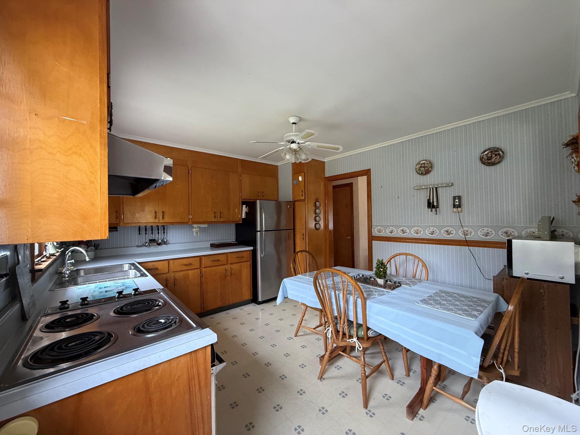 126 Perrys Corners Road Amenia, NY 12501 - Photo 6 of 16 a kitchen that has a table and chairs in it