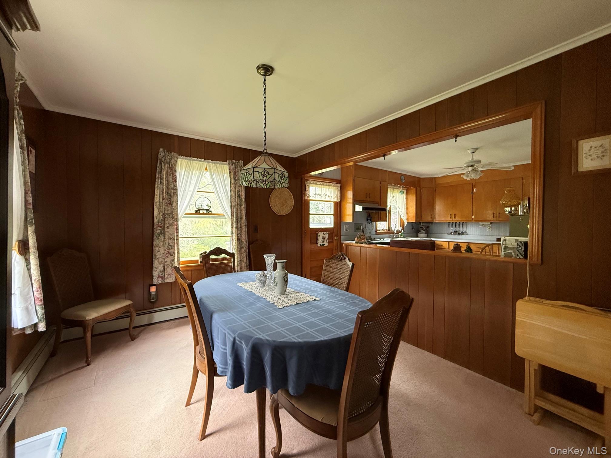 126 Perrys Corners Road Amenia, NY 12501 - Photo 8 of 16 a view of a dining room with furniture window and wooden floor