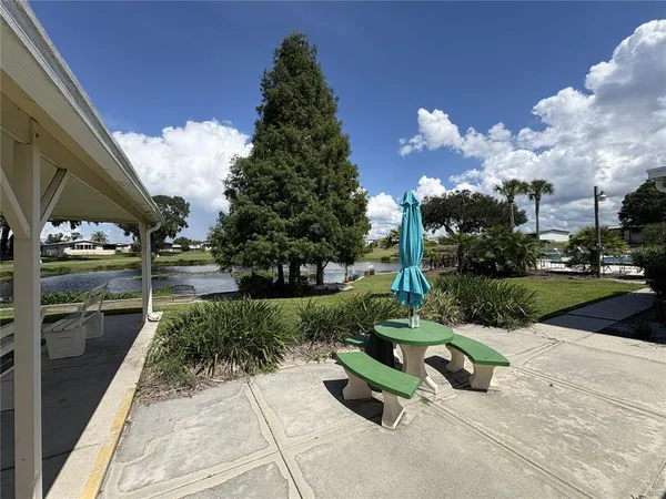 a view of a garden with patio