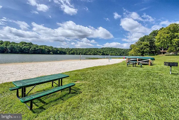 a view of lake with green space