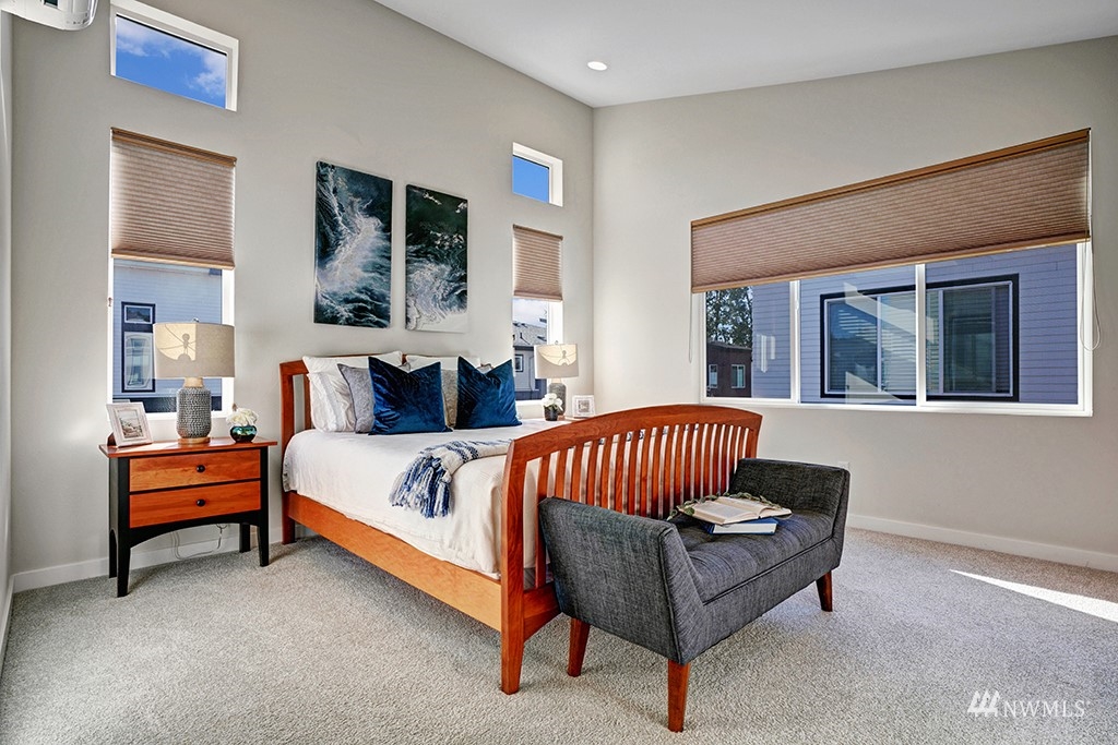 518 238th Street Southeast, Unit A Bothell, WA 98021 - Photo 14 of 31 a bedroom with a bed and window