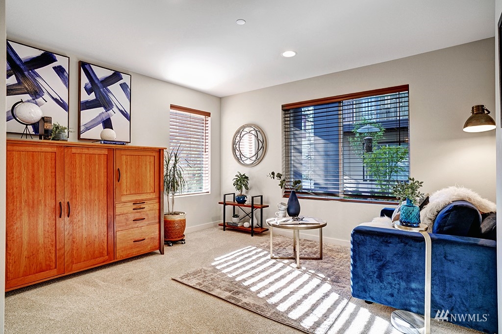 518 238th Street Southeast, Unit A Bothell, WA 98021 - Photo 23 of 31 a living room with furniture and a large window