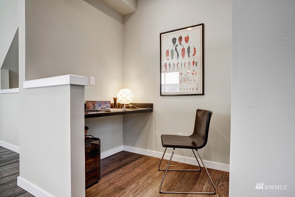 518 238th Street Southeast, Unit A Bothell, WA 98021 - Photo 27 of 31 a view of a workspace with furniture and wooden floor