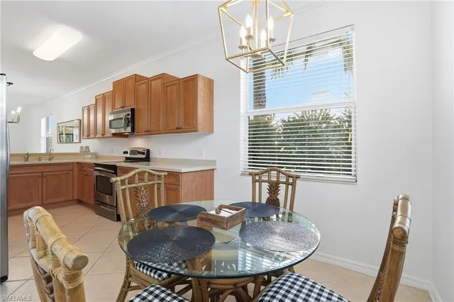 a kitchen with granite countertop a sink and a stove