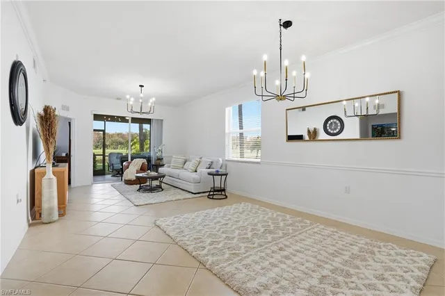 a view of living room with furniture and a window
