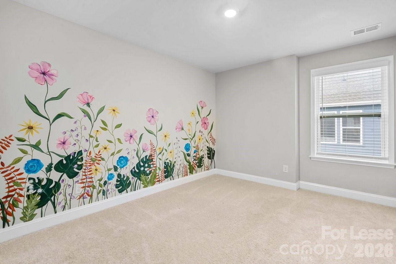 1515 Hidden Falls Road Charlotte, NC 28206 - Photo 25 of 35 a view of lot of flowers in a window