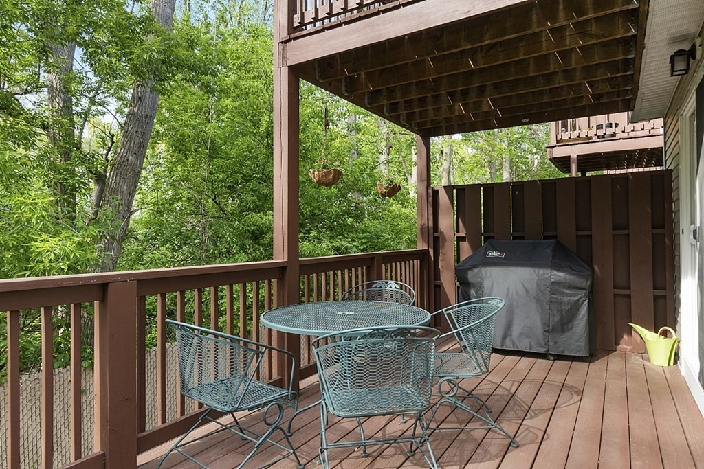 1541 Middlesex Street, Unit 16 Lowell, MA 01851 - Photo 20 of 29 a view of a balcony with furniture