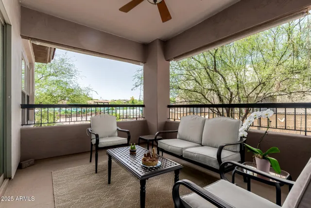 a bathroom with a sink toilet vanity and tub