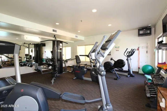 a view of a dinning table and chairs in the patio