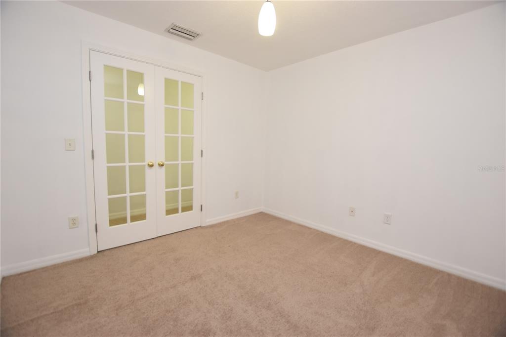 5410 River Rock Road Lakeland, FL 33809 - Photo 17 of 26 an empty room with a window