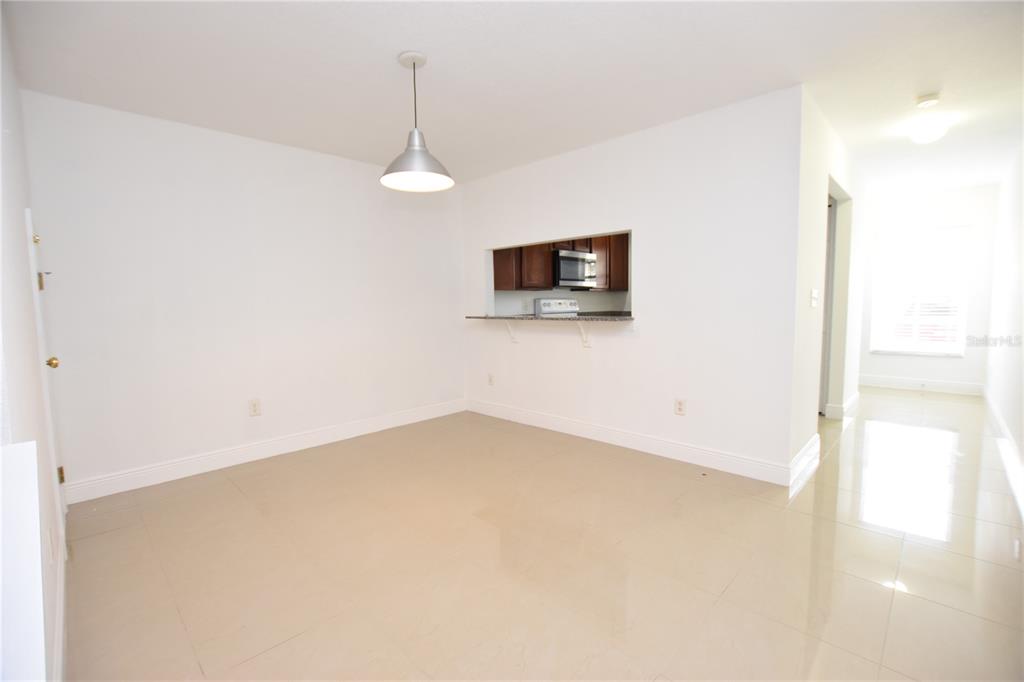 5410 River Rock Road Lakeland, FL 33809 - Photo 7 of 26 a view of a livingroom with a flat screen tv