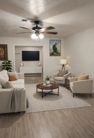 a living room with furniture and a flat screen tv