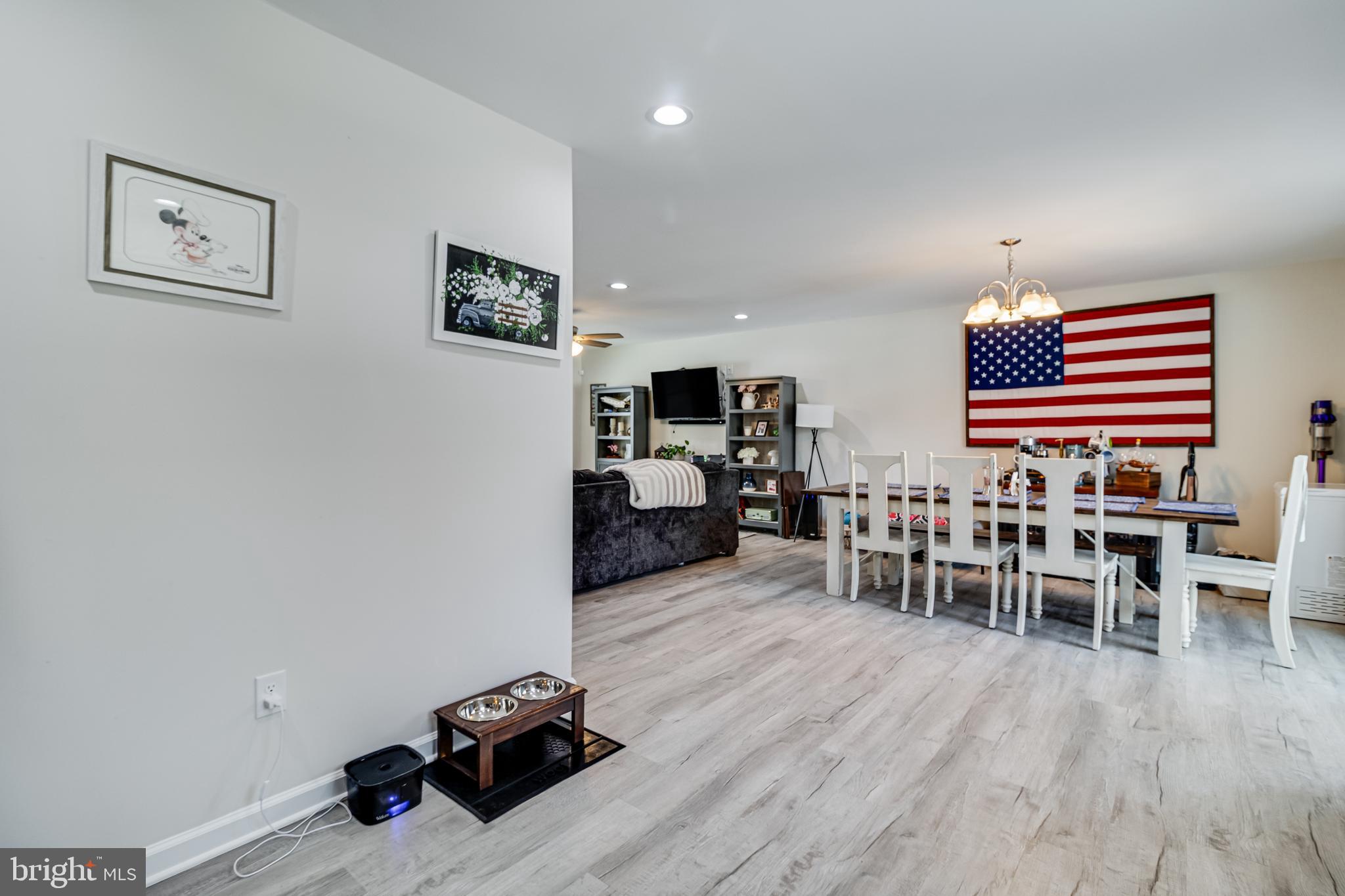 339 Azure Drive Colonial Beach, VA 22443 - Photo 11 of 28 a room with furniture and wooden floor