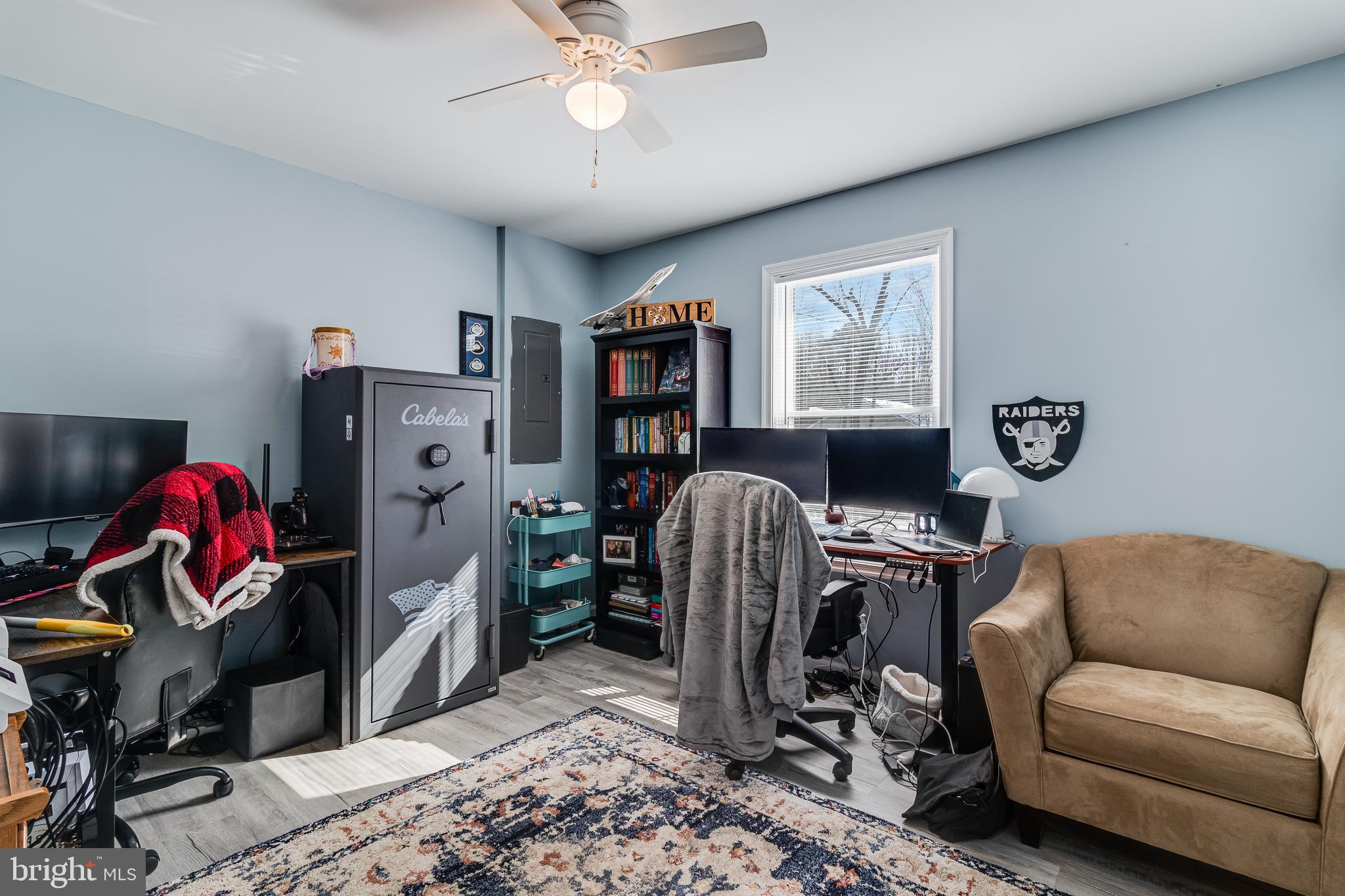 339 Azure Drive Colonial Beach, VA 22443 - Photo 18 of 28 a view of a workspace with furniture and gym equipment